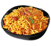 A bowl of Ganga Vilas Special Mixture, which appears to be a spicy snack made of mixed beans and noodles.